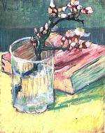Blossoming Almond Branch in a Glass with a Book